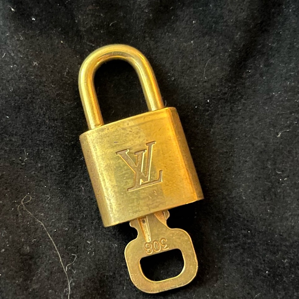 #308 Louis Vuitton Lock and key